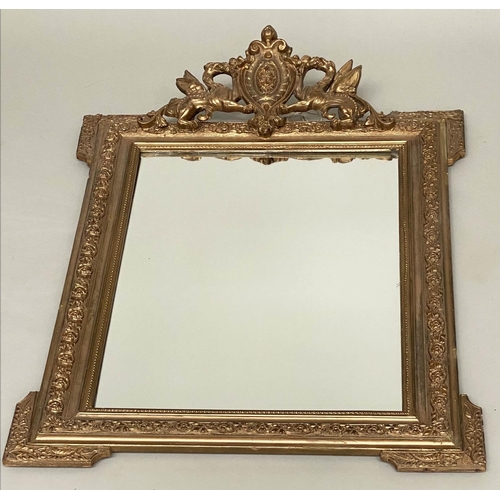 128 - WALL MIRROR, late 19th/early 20th century French giltwood and gesso moulded with griffin and shield ... 