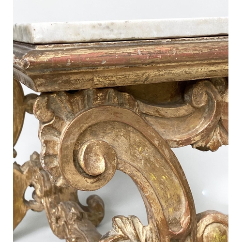 130 - CONSOLE TABLE, Italian carved giltwood with C scroll trestles united by a shaped stretcher and inset... 