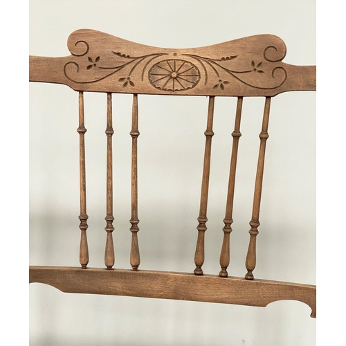 139 - HALL BENCH, early 20th century Edwardian carved fruitwood with turned spindle back and brass studded... 