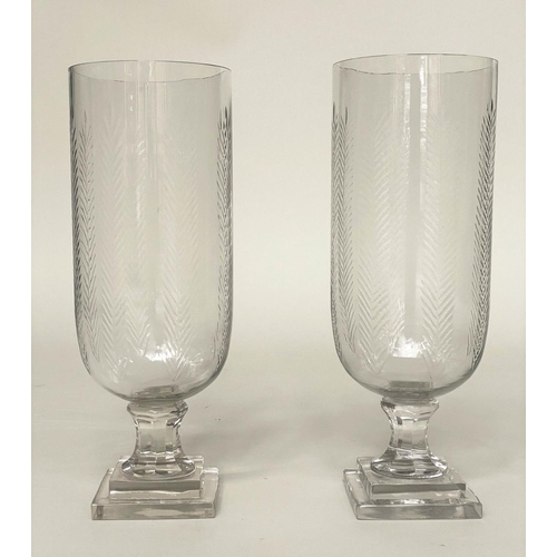 140 - STORM LANTERNS, a pair, etched cut glass cylindrical with stepped base, 40cm H. (2)