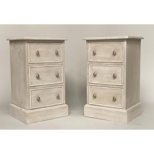 147 - BEDSIDE CHESTS, a pair, grey painted each with three drawers and plinth base, 64cm H x 38cm x 33cm. ... 