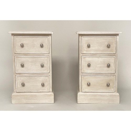 147 - BEDSIDE CHESTS, a pair, grey painted each with three drawers and plinth base, 64cm H x 38cm x 33cm. ... 