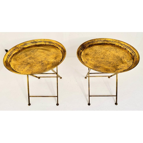 471 - SIDE TABLES, a pair, aged gilt finished metal, folding design, 66cm x 66cm x 66cm.