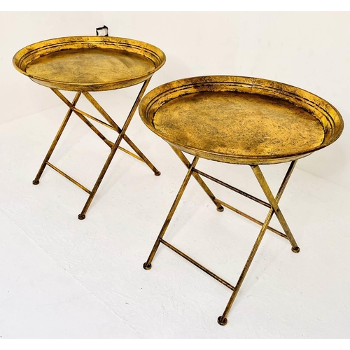 471 - SIDE TABLES, a pair, aged gilt finished metal, folding design, 66cm x 66cm x 66cm.