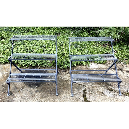 487 - GARDEN ÉTAGÈRES, a pair, painted metal, 63cm x 62cm x 69cm.