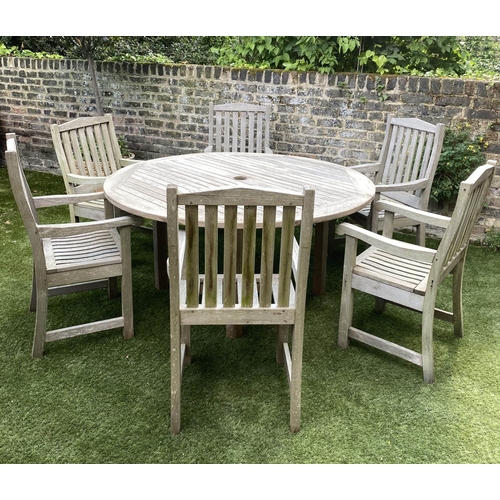 489 - CIRCULAR GARDEN TABLE AND CHAIRS, silvery weathered teak, including a set of six armchairs by Lister... 