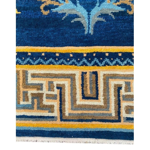 80 - TIBETAN TEMPLE CARPET, 365cm x 240cm.