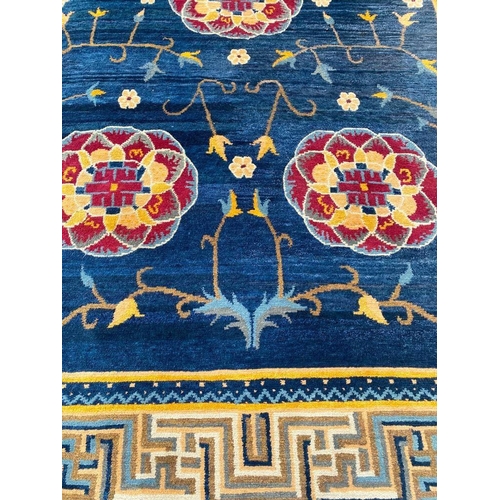 80 - TIBETAN TEMPLE CARPET, 365cm x 240cm.