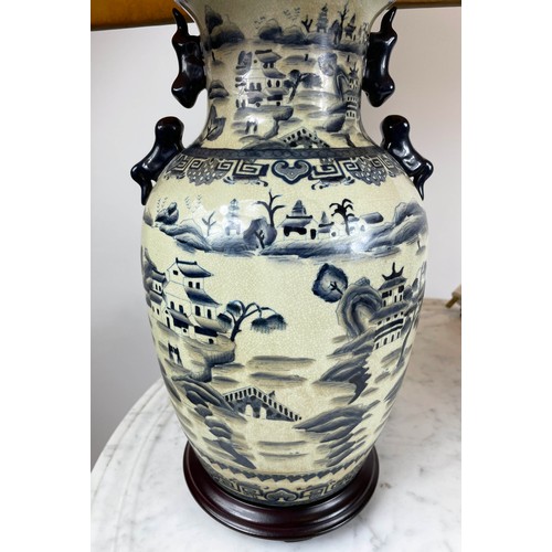 27 - LAMPS, a pair, Chinese vase form blue and white decorated with pagodas and landscape scenes with squ... 