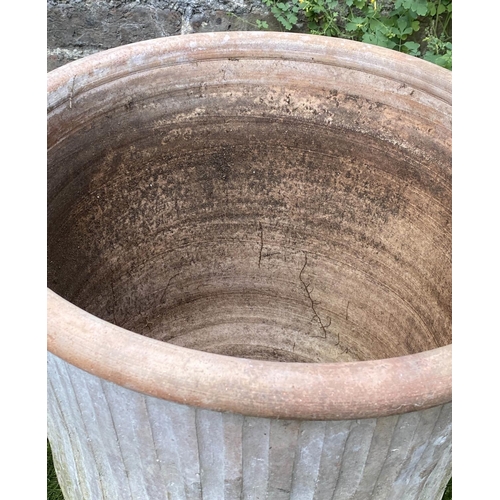 124 - GARDEN PLANTERS, a pair, weathered terracotta each of tapering fluted form, 46cm W H x 46cm W. (2)