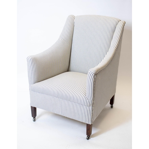 180 - ARMCHAIR, Edwardian in ticking with steel castors, 85cm H x 61cm.