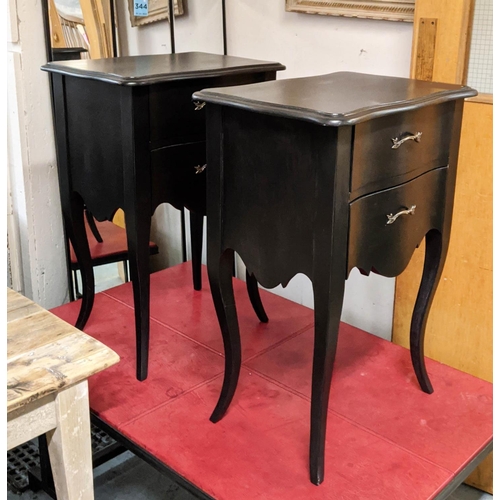 401 - COACH HOUSE SIDE CABINETS, a pair, French provincial style, ebonised with two drawers to each, 55cm ... 