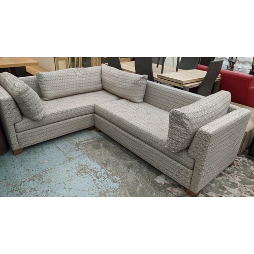 427 - CORNER SOFA, 258cm x 199cm x 90cm with patterned upholstery. (in two sections).