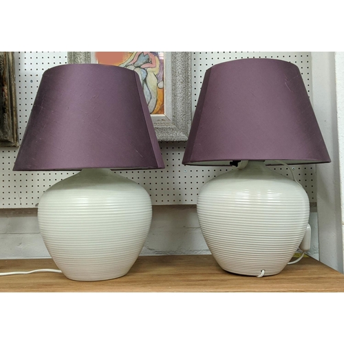 440 - TABLE LAMPS, a pair, 51cm H white, each with a purple shade. (2)