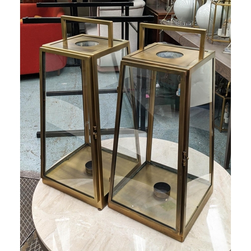 442 - STORM LANTERN, a pair, each 78cm H x 37cm x 57cm, antiqued bronzed finish. (2)