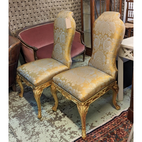 448 - DINING CHAIRS, a set of eight, each 60cm W x 110cm H, carved gilt wood frames with Damask upholstery... 