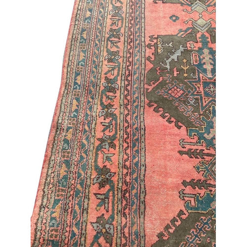 72 - ANTIQUE TURKISH OUSHAK CARPET, 520cm x 365cm.