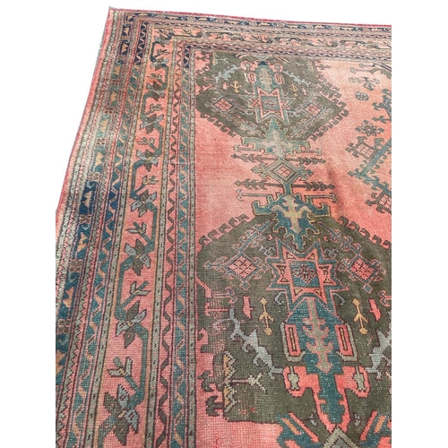 72 - ANTIQUE TURKISH OUSHAK CARPET, 520cm x 365cm.