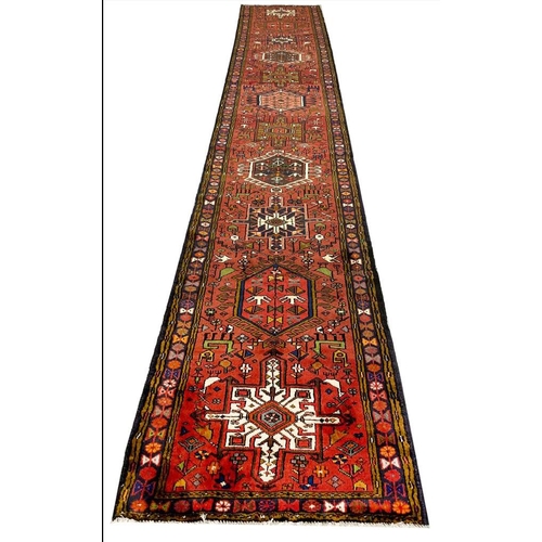 84 - PERSIAN KARAJA LONG RUNNER, 481cm x 80cm.