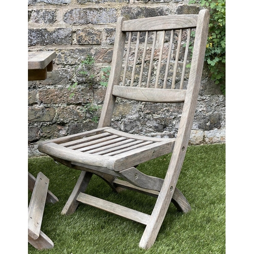 129 - CHILD'S GARDEN ARMCHAIRS, a pair, weathered teak, folding with spindle back together with a lattice ... 