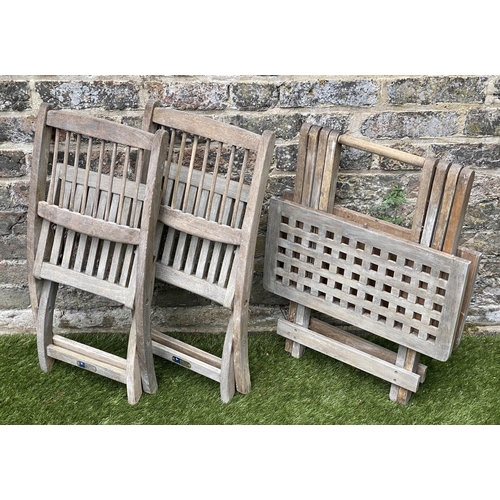 129 - CHILD'S GARDEN ARMCHAIRS, a pair, weathered teak, folding with spindle back together with a lattice ... 