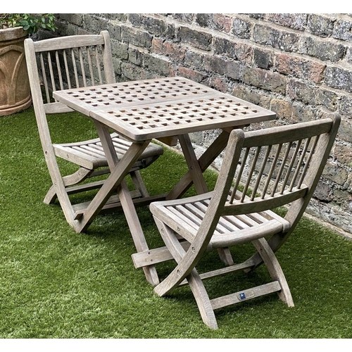 129 - CHILD'S GARDEN ARMCHAIRS, a pair, weathered teak, folding with spindle back together with a lattice ... 