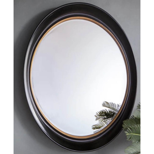 412 - OVAL WALL MIRROR, Regency Style, black frame, gilt accent, 100cm W x 8.5cm D x 77 cm H.