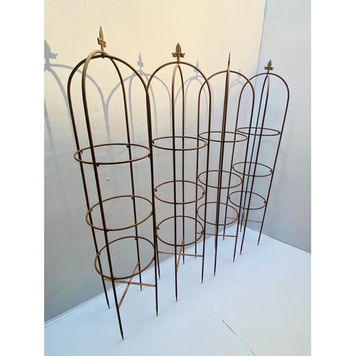 391 - ARCHITECTURAL GARDEN OBELISKS, set of four, 150cm high, 33cm diameter, distressed rust finish metal.... 