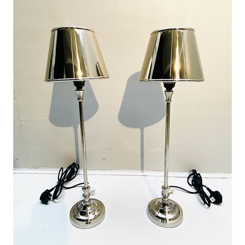 395 - LIBRARY TABLE LAMPS, a pair, 64cm high, 20cm diameter, polished metal, with shades. (2)