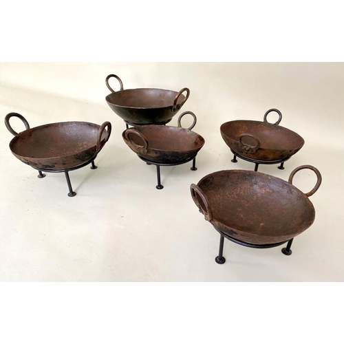 397 - INDIAN STYLE KADAI FIRE BOWLS ON STANDS, a set of five, 46cm diam. at largest, of various sizes. (5)