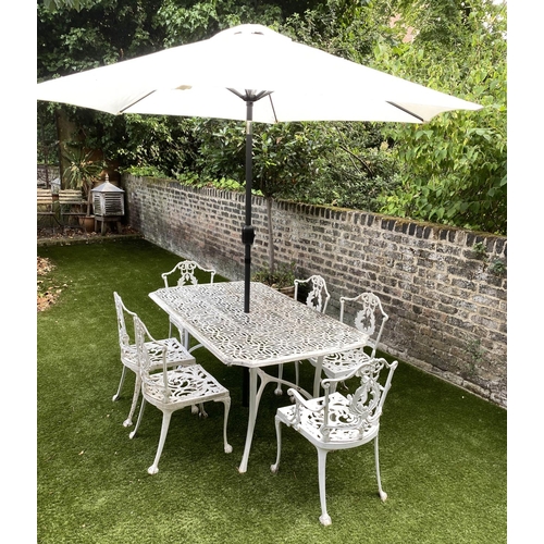 127 - GARDEN TABLE AND CHAIRS, weathered cast aluminium with pierced table and six matching chairs, one wi... 