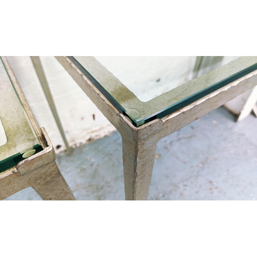 454 - ADAM WILLIAMS TAPERED SIDE TABLES, a pair,  75.5cm x 50.5cm x 64cm, silvered metal bases, glass top.... 