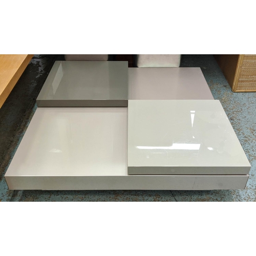 443 - LOW TABLE, contemporary lacquered design, mirrored base with two revolving sections, 125cm x 122cm x... 