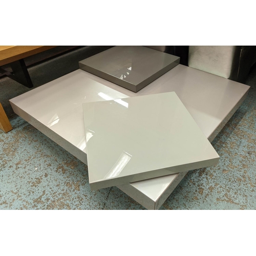 443 - LOW TABLE, contemporary lacquered design, mirrored base with two revolving sections, 125cm x 122cm x... 