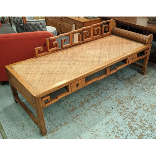 446 - CHINESE DAYBED, 188cm L x 71cm D, elm and rattan with revolving headrest and two drawers.