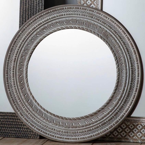 377 - CIRCULAR WALL MIRROR, Moroccan style carved frame with washed finish, 90cm diam.