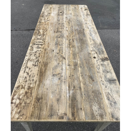 437 - FARMHOUSE KITCHEN TABLE, 75cm high, 195cm long, 79cm wide, aged limed pine, plank top, tapered legs.