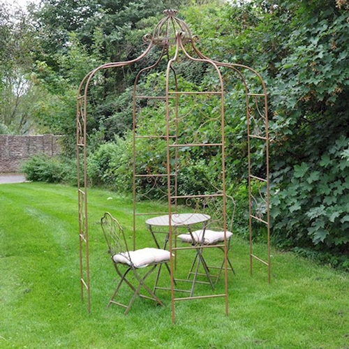 422 - ARCHITECTURAL GARDEN PERGOLA, 275cm high, 155cm diameter, Regency style, aged finish.