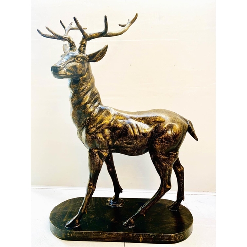 417 - SCULPTURAL STAG, 154cm high, 105cm wide, 50cm deep, cast metal, bronzed finish.