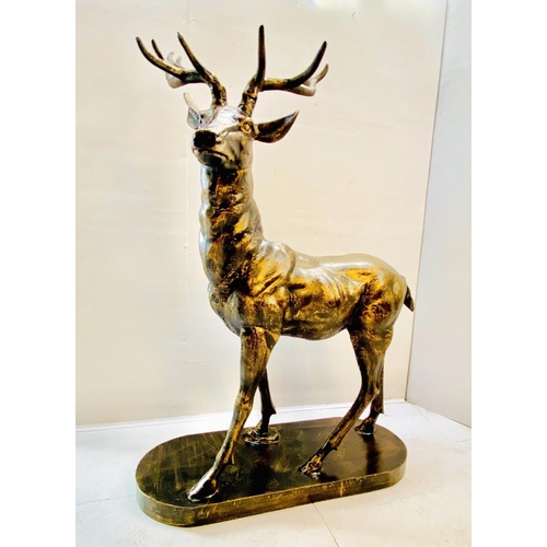 417 - SCULPTURAL STAG, 154cm high, 105cm wide, 50cm deep, cast metal, bronzed finish.