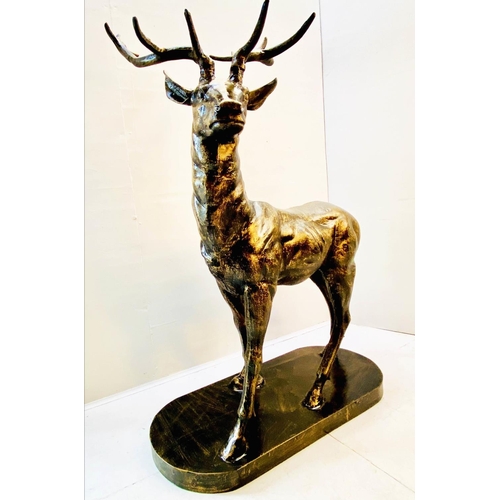 417 - SCULPTURAL STAG, 154cm high, 105cm wide, 50cm deep, cast metal, bronzed finish.