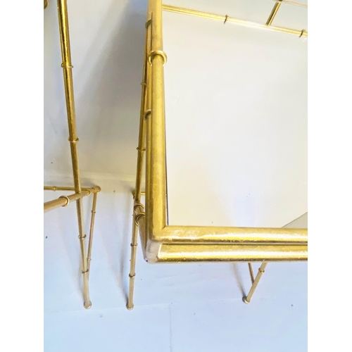 419 - MAISON BAGUES STYLE SIDE TABLES, a pair, 68cm H x 36cm W, mirrored glass tops, faux bamboo gilt meta... 