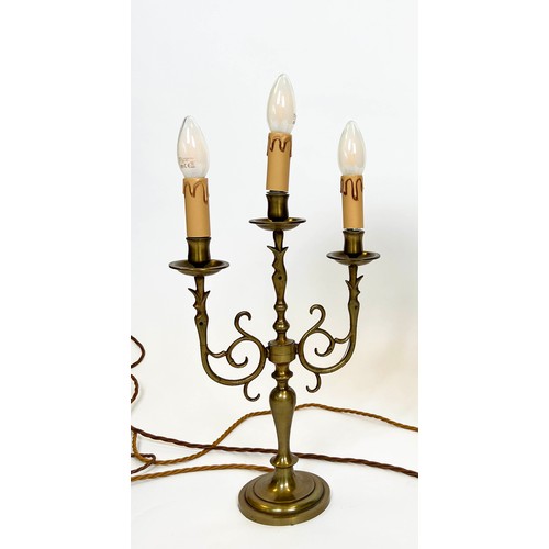 11 - ECCLESIASTICAL CANDLESTICK LAMPS, and a pair of three scrolling branch candlestick lamps, 60cm H. (3... 