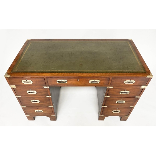 102 - CAMPAIGN STYLE DESK, mahogany and brass bound with gilt tooled green leather top and nine drawers, 1... 