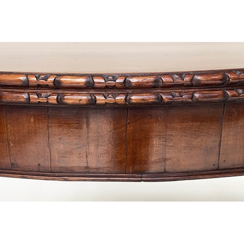 128 - TEA TABLE, George III figured mahogany of serpentine outline, carved edge, and fold over top, 91cm W... 