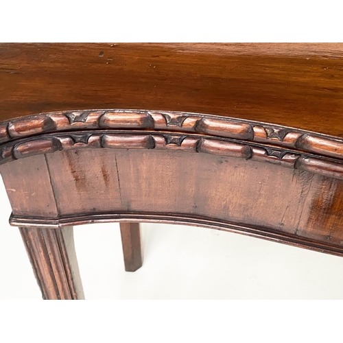 128 - TEA TABLE, George III figured mahogany of serpentine outline, carved edge, and fold over top, 91cm W... 