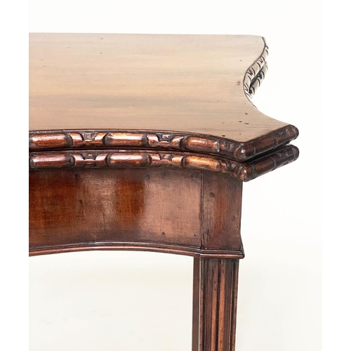 128 - TEA TABLE, George III figured mahogany of serpentine outline, carved edge, and fold over top, 91cm W... 