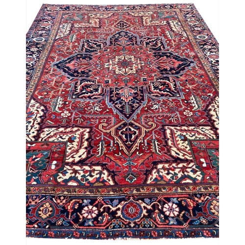 55 - ANTIQUE PERSIAN HERIZ CARPET, 314cm x 230cm.