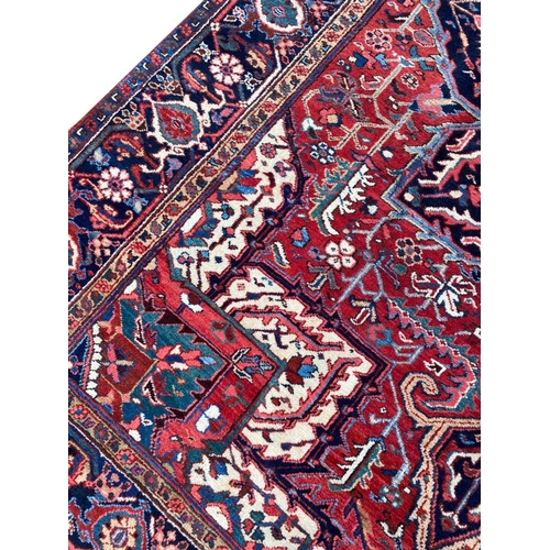 55 - ANTIQUE PERSIAN HERIZ CARPET, 314cm x 230cm.