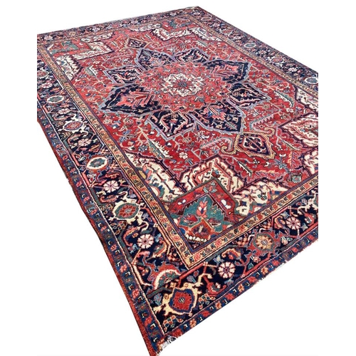 55 - ANTIQUE PERSIAN HERIZ CARPET, 314cm x 230cm.